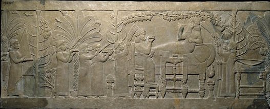 Ashurbanipal and Queen Assur-sharrat enjoy a quiet evening, with the head of an Elamite prince hanging in a nearby tree.
