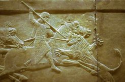 Emperor Ashurbanipal kills a lion